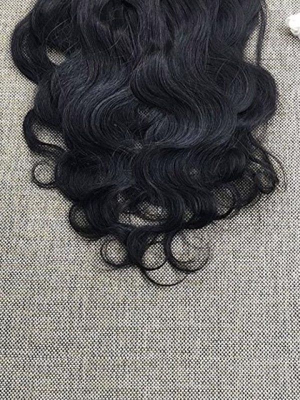Clip Nera Naturale Ondulata Nelle Estensioni Dei Capelli